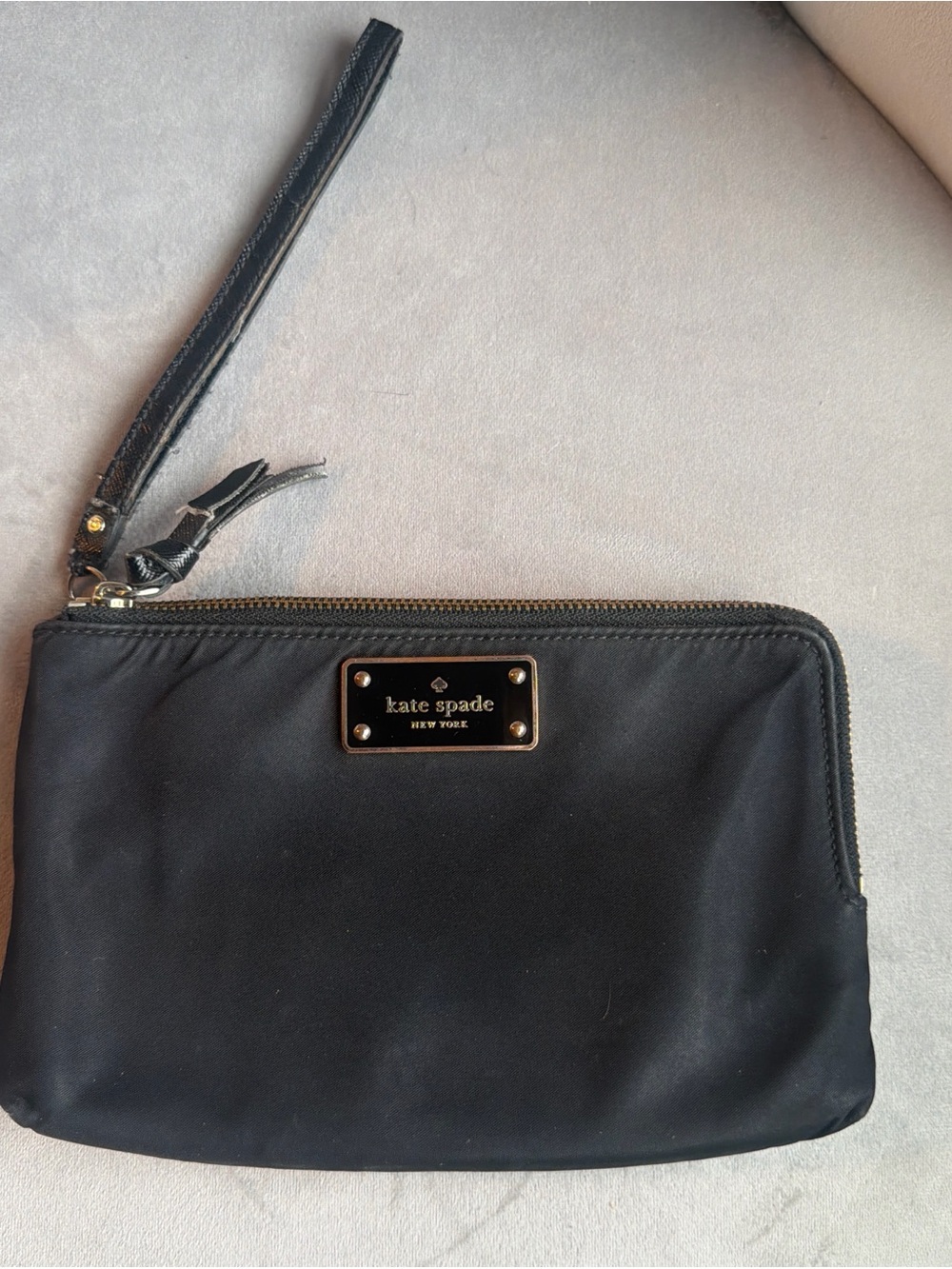 kate spade Black Nylon Wristlet with Gold Plaque